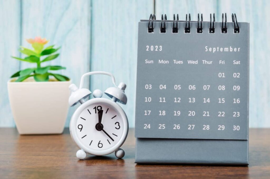 A 3.3% Dividend Stock That Pays Cash Every Month monthly calendar with clock