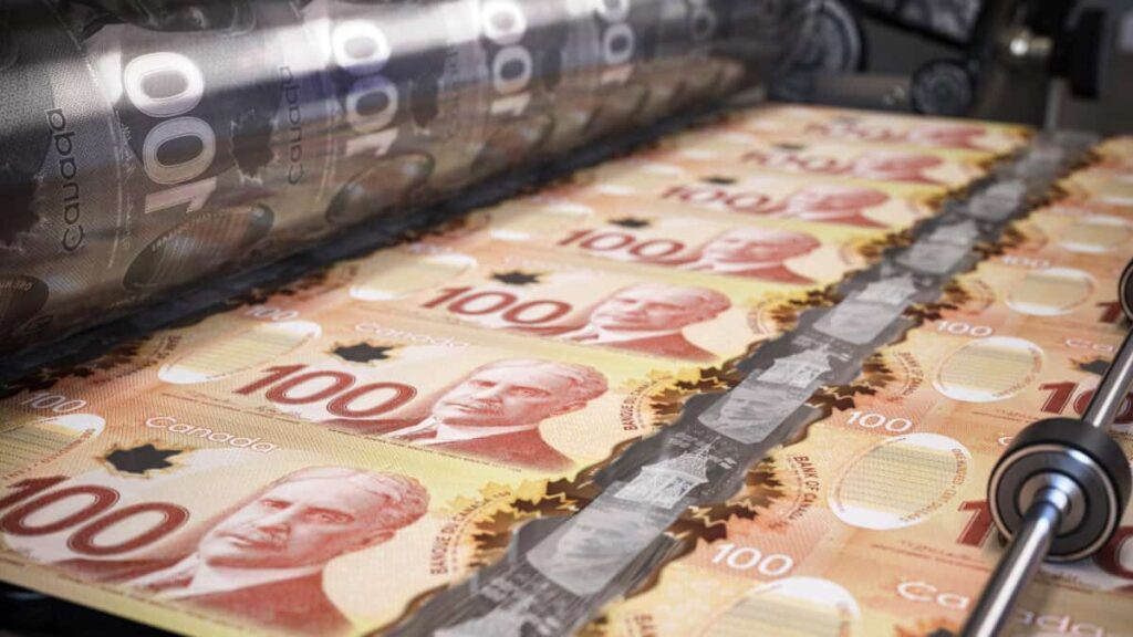 How to Turn Your TFSA Into an $83-a-Month Cash-Generating Machine Printing canadian dollar bills on a print machine